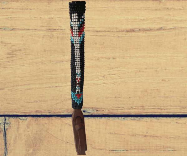 deatiled picture of Southwestern Inspired beading in the cheek strap of Black arrow One Eared bridle